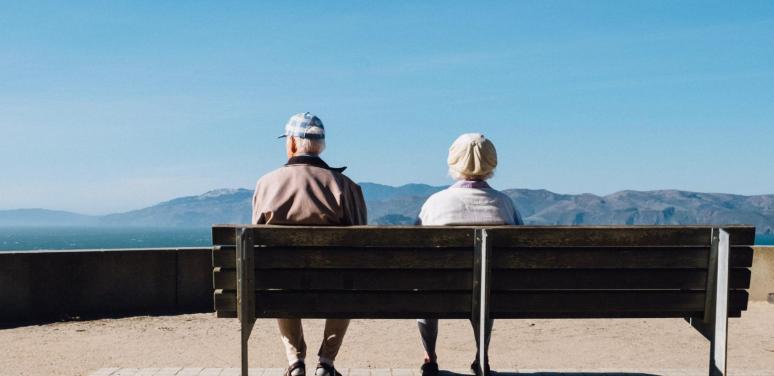 Seniors sitting on a park bench